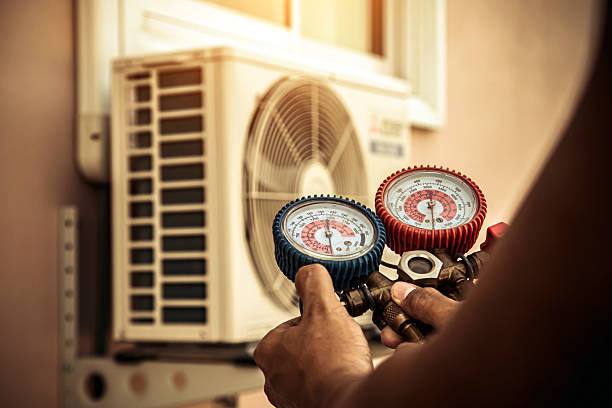 Professional Air Conditioning Service technician working in High Point, NC